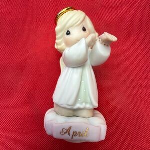 Precious Moments Angel Figurine with Gold and White Accents